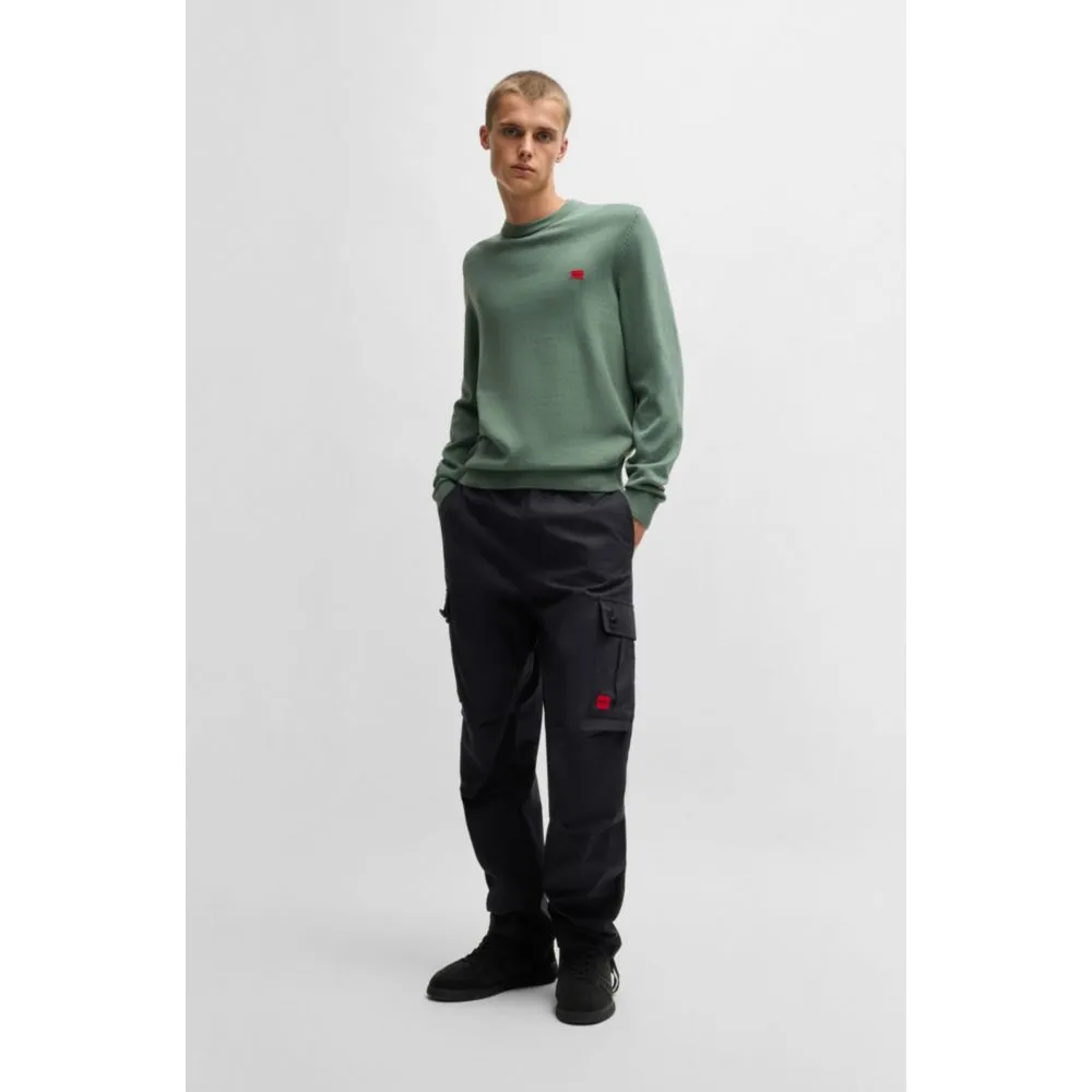 Knitted cotton sweater with red logo label