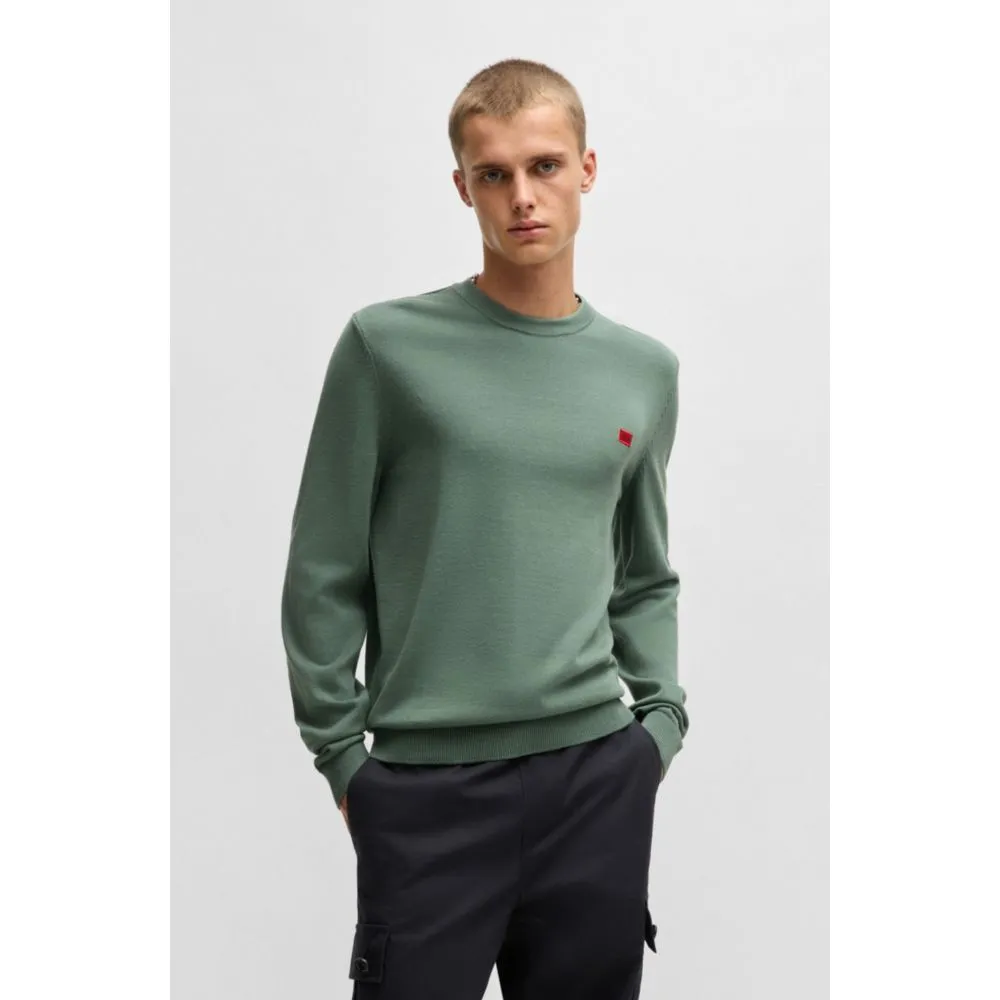 Knitted cotton sweater with red logo label